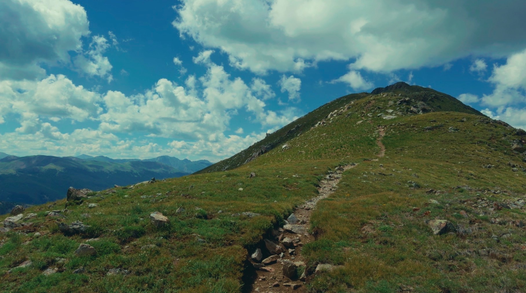 Cinematic mountain ridge landscape.